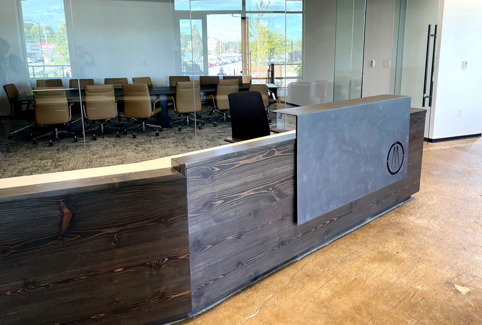 Reclaimed Pine Reception Desk with Company Logo Precision Water-Jetted into Steel Accent