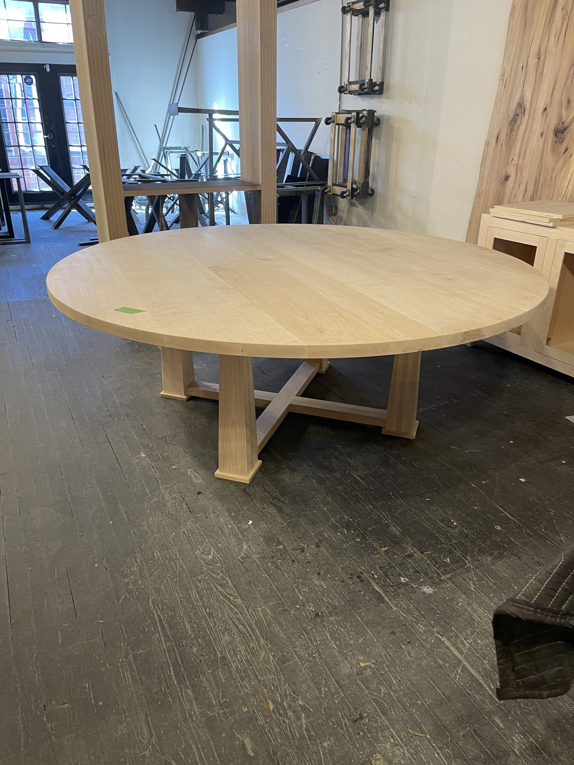 Round reclaimed oak conference table